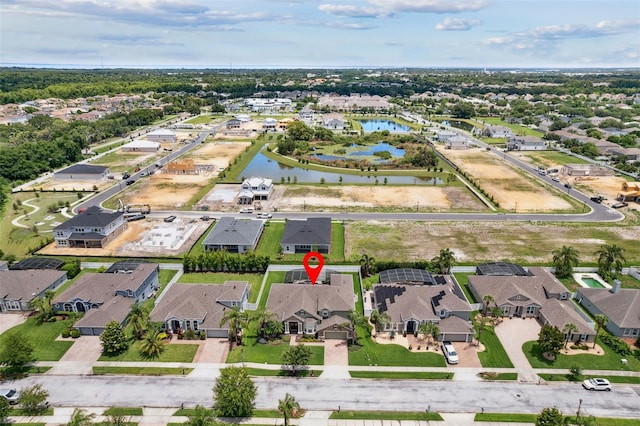 724 Duff Dr, Winter Garden, FL 34787 - aerial view of property and surrounding area featuring a large body of water and nearby suburban area