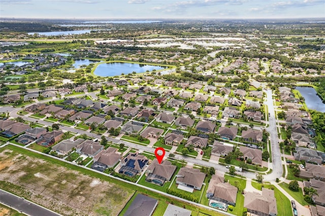 724 Duff Dr, Winter Garden, FL 34787 - aerial overview of property's location featuring a nearby body of water and nearby suburban area