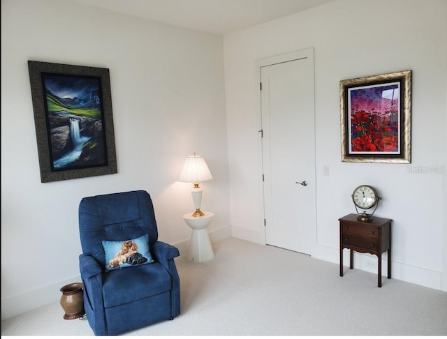 14835 Dockside Ln, Naples, FL 34114 - sitting room with carpet floors and baseboards