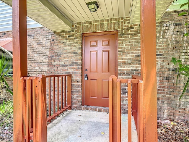 1591 Revere Ln, Daytona Beach, FL 32117 - entrance to property featuring brick siding and a porch