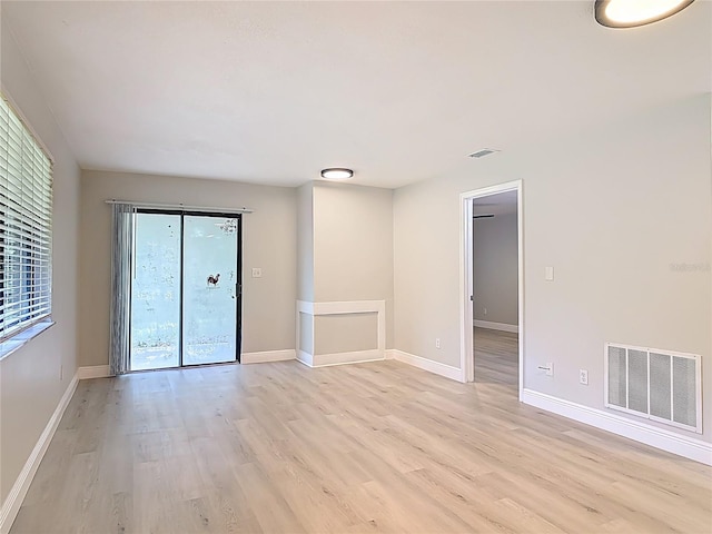 1591 Revere Ln, Daytona Beach, FL 32117 - empty room featuring light wood-style floors and baseboards
