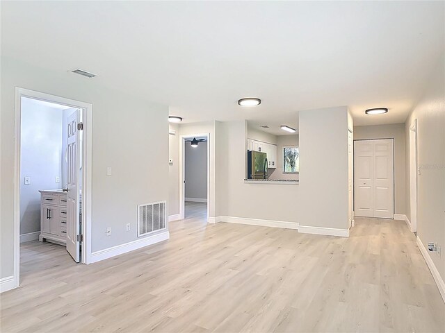 1591 Revere Ln, Daytona Beach, FL 32117 - empty room featuring light wood-style flooring and baseboards