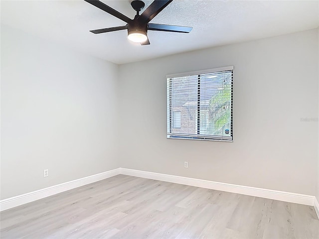 1591 Revere Ln, Daytona Beach, FL 32117 - empty room featuring light wood finished floors, a ceiling fan, and baseboards