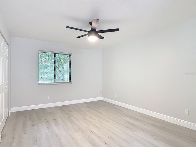 1591 Revere Ln, Daytona Beach, FL 32117 - empty room with light wood-style flooring, baseboards, and ceiling fan