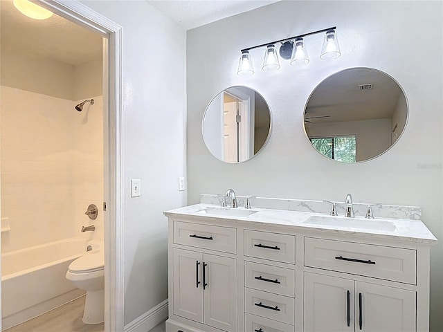 1591 Revere Ln, Daytona Beach, FL 32117 - bathroom featuring double vanity, toilet, tub / shower combination, and wood finished floors