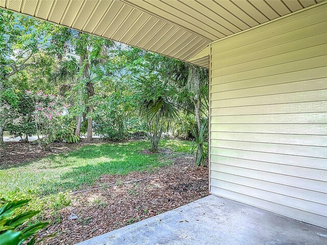 1591 Revere Ln, Daytona Beach, FL 32117 - view of yard featuring a patio