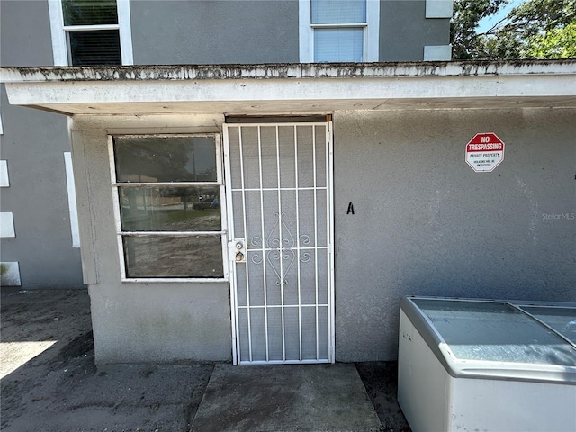 1238 Conley St, Orlando, FL 32805 - property entrance with stucco siding