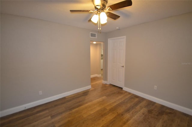 1238 Conley St, Orlando, FL 32805 - spare room featuring baseboards, a ceiling fan, and wood finished floors
