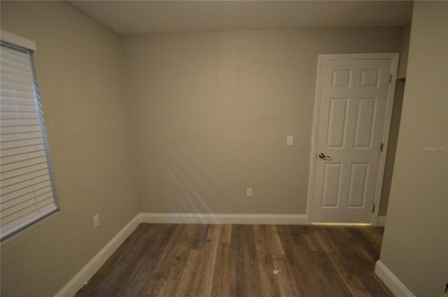1238 Conley St, Orlando, FL 32805 - empty room with wood finished floors and baseboards