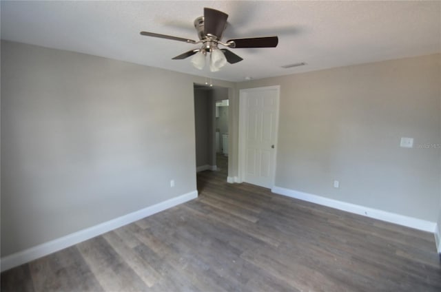 1238 Conley St, Orlando, FL 32805 - unfurnished room with baseboards, a ceiling fan, and wood finished floors