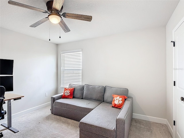 2943 Slough Creek Dr, Kissimmee, FL 34744 - office with light colored carpet, baseboards, ceiling fan, and a textured ceiling