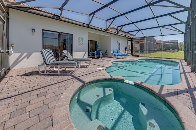 446 Summer Place Loop, Clermont, FL 34714 - view of swimming pool featuring a pool with connected hot tub, a patio, and glass enclosure