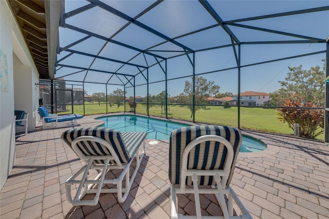 446 Summer Place Loop, Clermont, FL 34714 - outdoor pool featuring glass enclosure, a patio, and a lawn