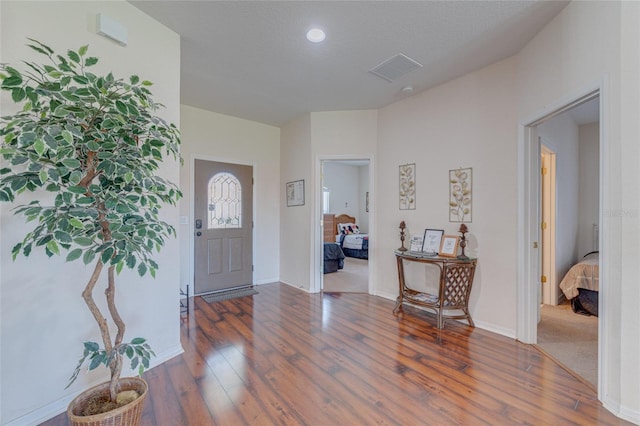 446 Summer Place Loop, Clermont, FL 34714 - foyer featuring wood-type flooring, baseboards, and recessed lighting