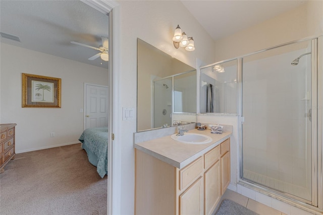446 Summer Place Loop, Clermont, FL 34714 - ensuite bathroom featuring a ceiling fan, a shower stall, and vanity