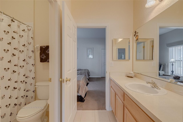 446 Summer Place Loop, Clermont, FL 34714 - ensuite bathroom with toilet, vanity, tile patterned flooring, and a shower with curtain