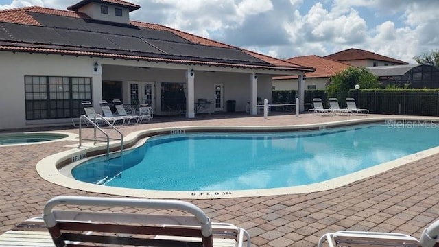 446 Summer Place Loop, Clermont, FL 34714 - community pool with a patio area, a hot tub, and fence
