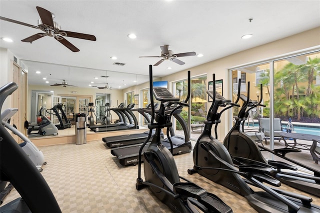 gym with recessed lighting, plenty of natural light, ceiling fan, and carpet flooring