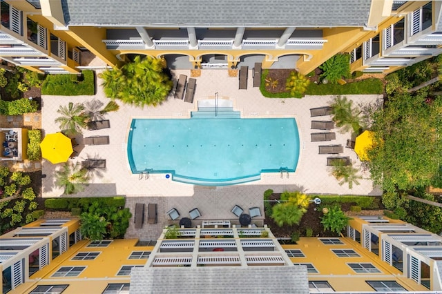 drone / aerial view of a pool