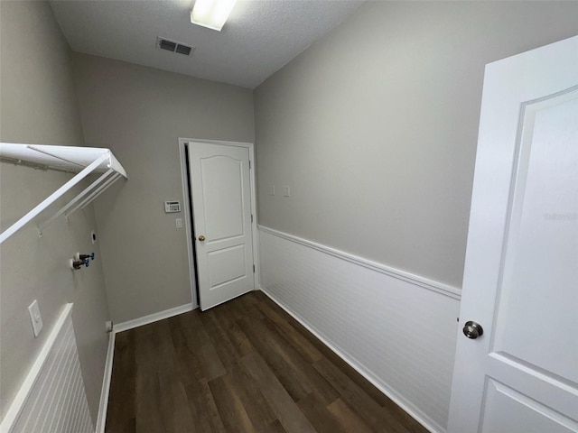 3707 Andover Cay Blvd, Orlando, FL 32825 - clothes washing area featuring dark wood-style floors and wainscoting