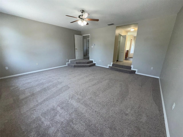 3707 Andover Cay Blvd, Orlando, FL 32825 - unfurnished room featuring ceiling fan, baseboards, and dark colored carpet