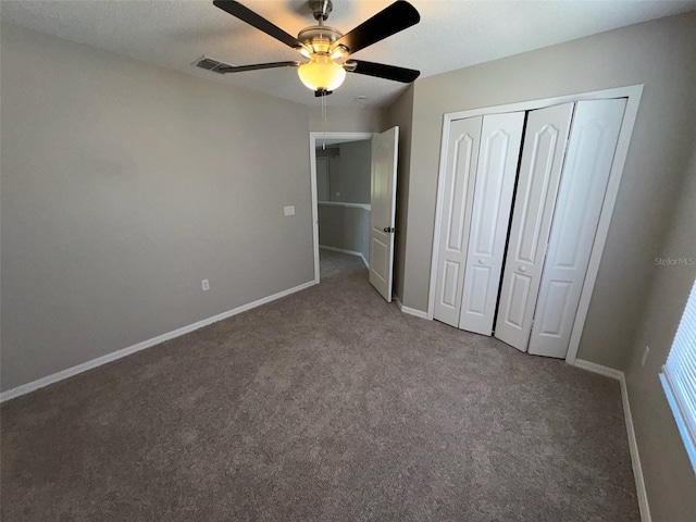 3707 Andover Cay Blvd, Orlando, FL 32825 - unfurnished bedroom featuring carpet, baseboards, a closet, and a ceiling fan