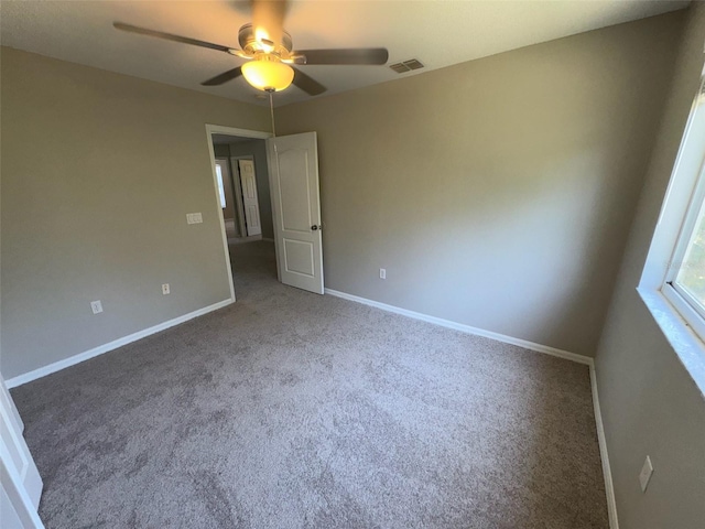 3707 Andover Cay Blvd, Orlando, FL 32825 - carpeted empty room with ceiling fan and baseboards