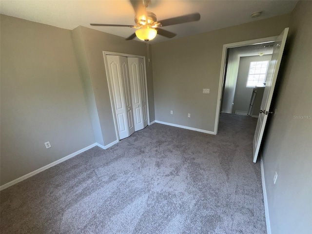 3707 Andover Cay Blvd, Orlando, FL 32825 - unfurnished bedroom with carpet flooring, a closet, baseboards, and ceiling fan