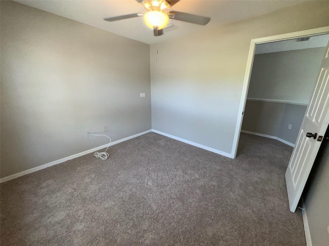 3707 Andover Cay Blvd, Orlando, FL 32825 - unfurnished bedroom featuring carpet, baseboards, and a ceiling fan
