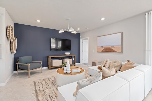 living room with recessed lighting, baseboards, and light tile patterned floors