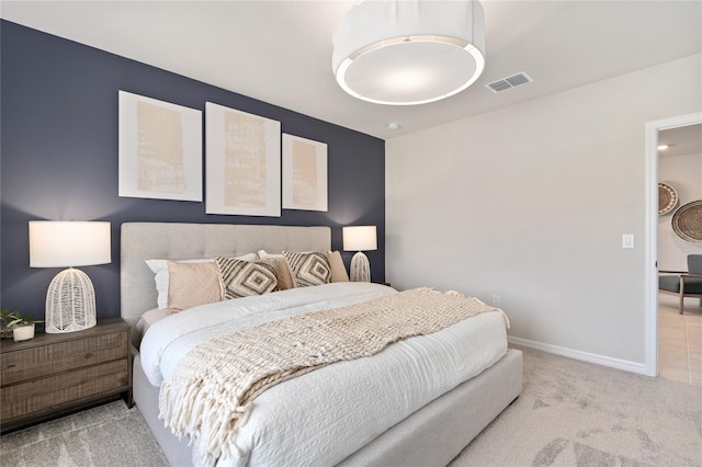 bedroom featuring carpet flooring and baseboards