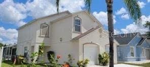 view of side of property with stucco siding