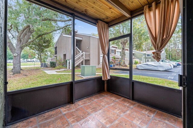 5071 Eaglesmere Dr Unit C01, Orlando, FL 32819 - sunroom featuring beam ceiling