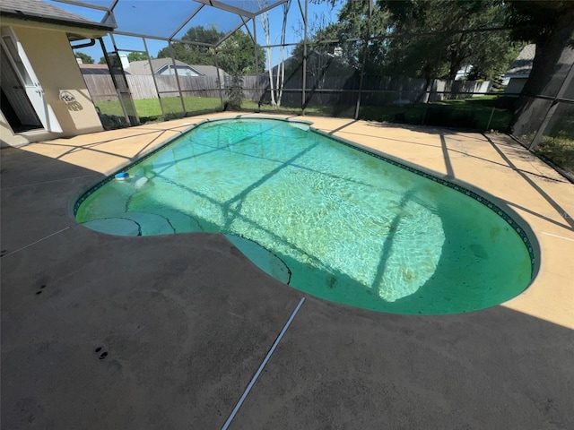 7507 Sandstone Dr, Orlando, FL 32836 - view of pool with a patio area, a fenced backyard, and a lanai