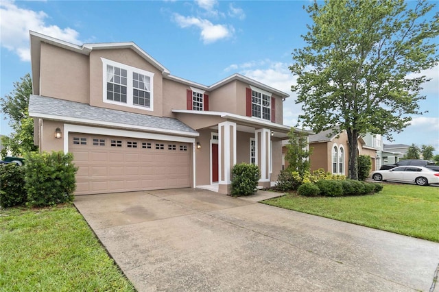 7551 Bear Claw Run, Orlando, FL 32825 - traditional-style house with stucco siding, concrete driveway, a garage, and a front yard