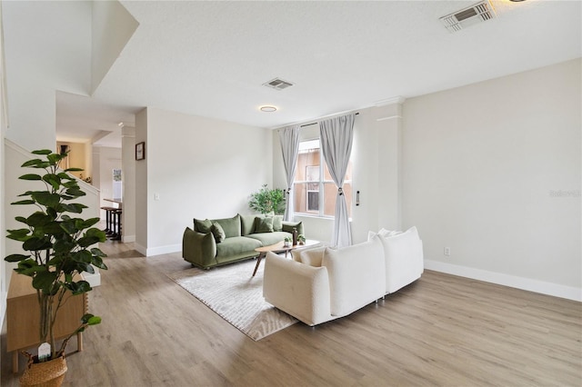 7551 Bear Claw Run, Orlando, FL 32825 - living room with wood finished floors and baseboards