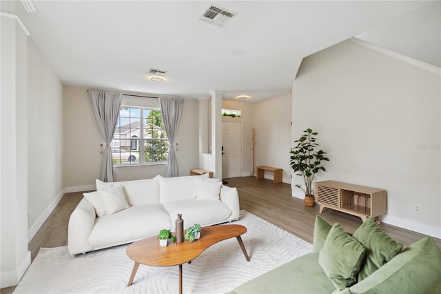 7551 Bear Claw Run, Orlando, FL 32825 - living room with wood finished floors and baseboards