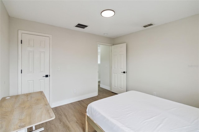 7551 Bear Claw Run, Orlando, FL 32825 - bedroom featuring wood finished floors and baseboards