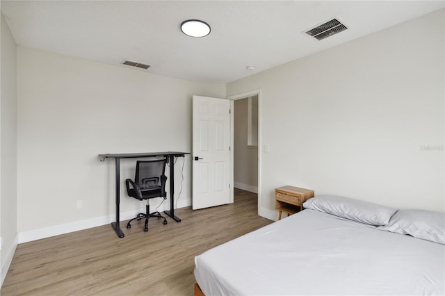 7551 Bear Claw Run, Orlando, FL 32825 - bedroom with light wood-style floors and baseboards