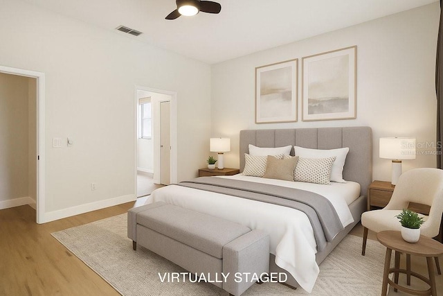 7551 Bear Claw Run, Orlando, FL 32825 - bedroom with light wood-style floors and baseboards