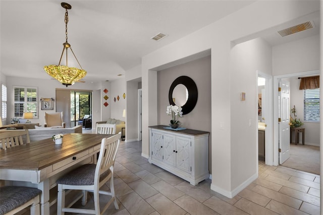 532 Casanova Ct, Kissimmee, FL 34759 - dining room featuring baseboards and light tile patterned floors