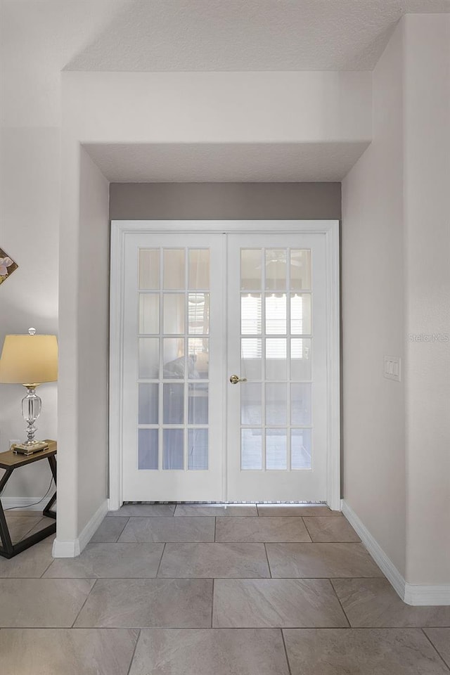 532 Casanova Ct, Kissimmee, FL 34759 - entryway with baseboards and french doors