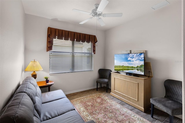 532 Casanova Ct, Kissimmee, FL 34759 - living room featuring baseboards, a ceiling fan, and wood finished floors