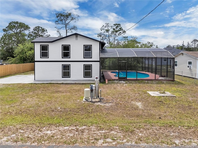 1840 Lillian Dr, Saint Cloud, FL 34771 - rear view of house featuring a patio area and a lanai