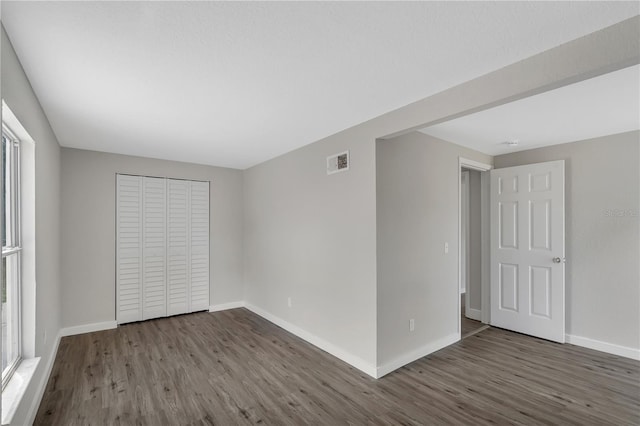 1840 Lillian Dr, Saint Cloud, FL 34771 - spare room with wood finished floors and baseboards