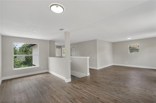 1840 Lillian Dr, Saint Cloud, FL 34771 - spare room featuring baseboards and wood finished floors