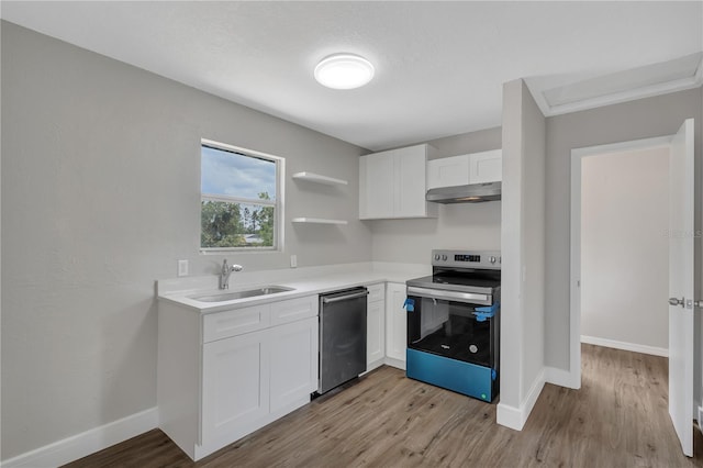 1840 Lillian Dr, Saint Cloud, FL 34771 - kitchen with stainless steel appliances, a sink, under cabinet range hood, and light wood-type flooring