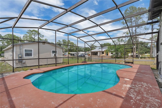 1840 Lillian Dr, Saint Cloud, FL 34771 - outdoor pool with glass enclosure and a patio area