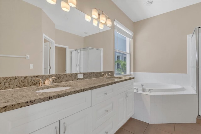 full bath with tile patterned flooring, a garden tub, double vanity, and a shower stall
