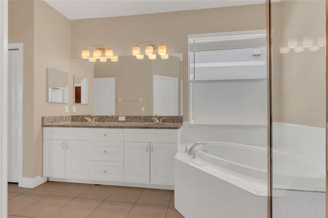 full bathroom with a garden tub, tile patterned flooring, and double vanity